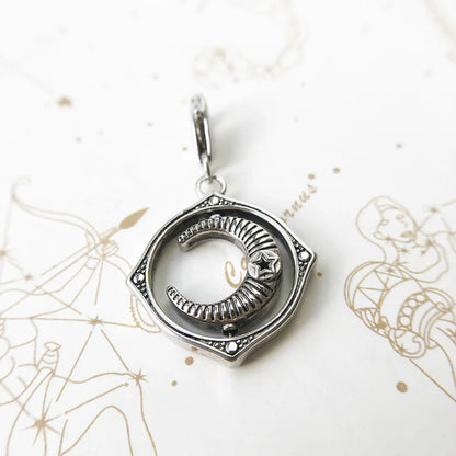 Spinning Moon Charm