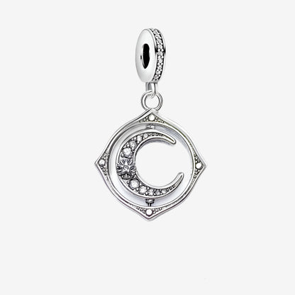Spinning Moon Charm